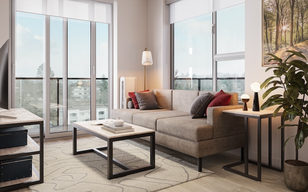 Living Room Spacious well lit living room with wood floors large windows and open access to the kitchen.